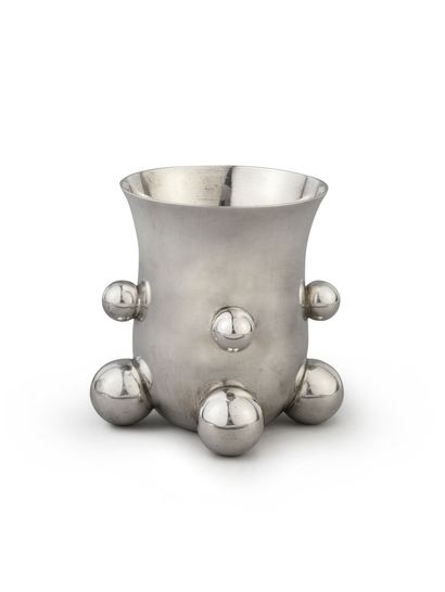 null Timbale in silver 1st title, the plain body is decorated with four spherical...