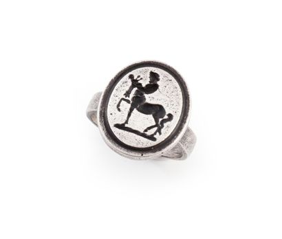 null Iron ring with oval bezel engraved with a figure of the centaur Chiron and young...