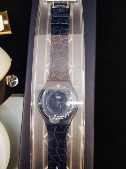 null SWATCH.Set of three boxes including : Swatch x Vivienne Westwood taking the...