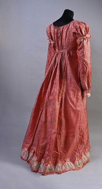 null Afternoon dress, circa 1820, high-waisted dress with flowing neckline in black...