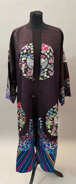 null Dress, China, twentieth century, midnight blue silk twill dress amply embroidered...