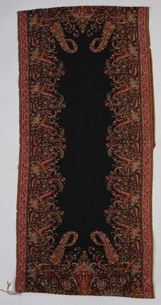 null Cashmere stole, circa 1845, plain black field surrounded by arabesques of flowers...