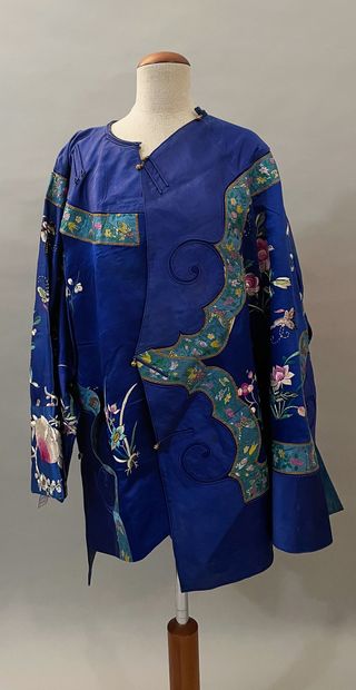 null Women's jacket, China, 20th century, royal blue satin jacket applied with polychrome...