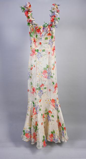 null Cocktail dress, circa 1930, sleeveless chiffon sheath printed with a vivid field...