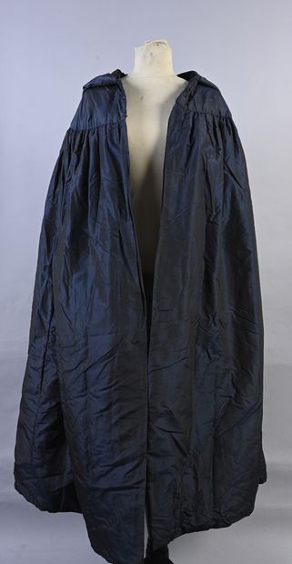 null Hooded mantle, mid-19th century, lightly quilted mantle in midnight blue changeable...