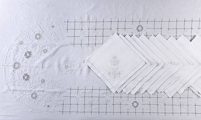 Embroidered tablecloth and twelve napkins,...