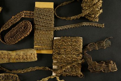null Gold and bronze passementerie braids, early 20th century.

Important meeting...