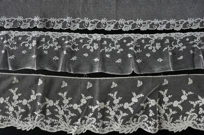 null Six lace borders, Carrickmacross, late 19th century.

Three with typical Carrickmacross...