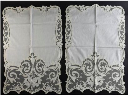 null A pair of lace breakers, early twentieth century.

Linen and application on...
