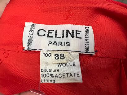 null CELINE PARIS, jupe longue évasée en laine rouge, à effet de larges plis, ceinture...