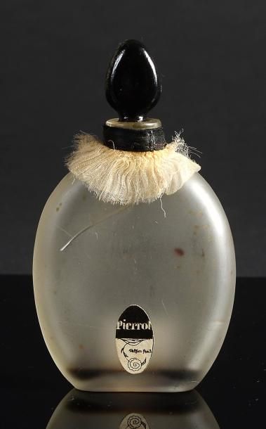 ROSINE (PAUL POIRET) «Pierrot» - (années 1910) Rare flacon en verre incolore pressé...