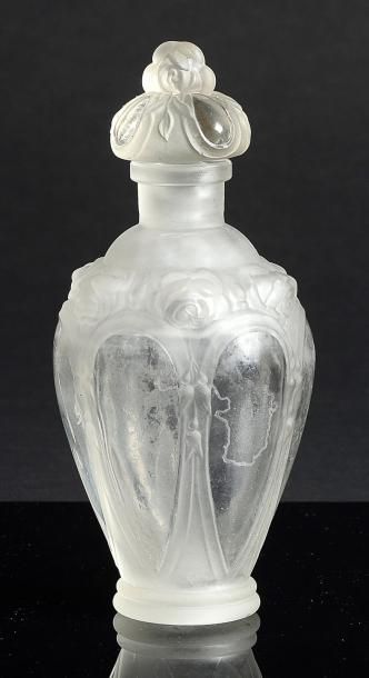 CORYSE «Rose d'Hispahan» - (1920) Flacon en verre incolore pressé moulé partiellement...