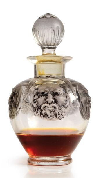 JULIEN VIARD - (1883-1938) - (attribué à) Somptueux flacon à parfum en verre incolore...