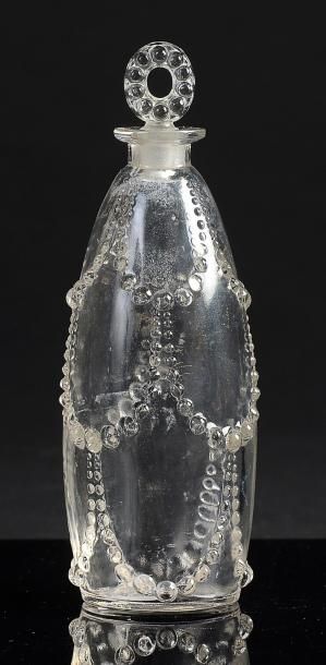 RENE LALIQUE «Palerme» - (années 1920) Flacon à parfum en verre incolore pressé moulé...