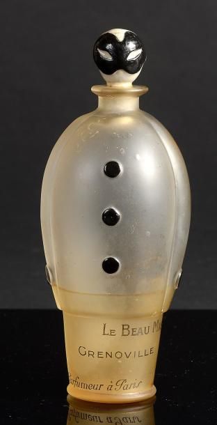 GRENOVILLE «Le Beau Masque» - (années 1910) Rare flacon en verre incolore pressé...