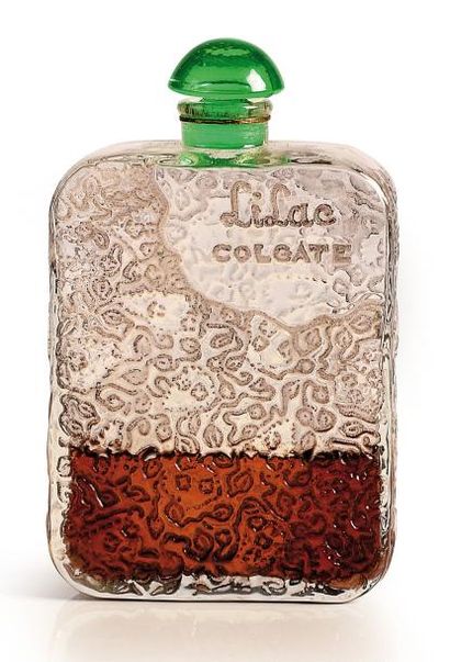 COLGATE «Lilas» - (années 1930) Rare flacon en verre incolore pressé moulé de section...