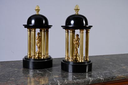 null Pair of temples in black marble and gilt bronze presenting a dome topped by...