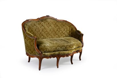 null Small basket sofa in molded and carved walnut, decorated with foliage, flowers...