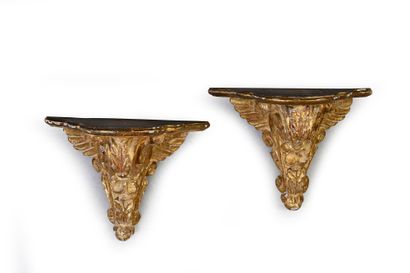 Pair of sconces in carved and gilded wood...