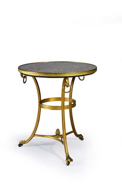 Gilt bronze and chiseled pedestal table,...