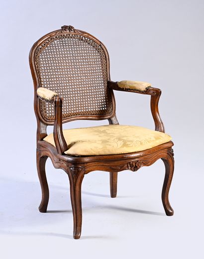 null Flat back caned armchair in molded and carved beech, the belt moved and the...