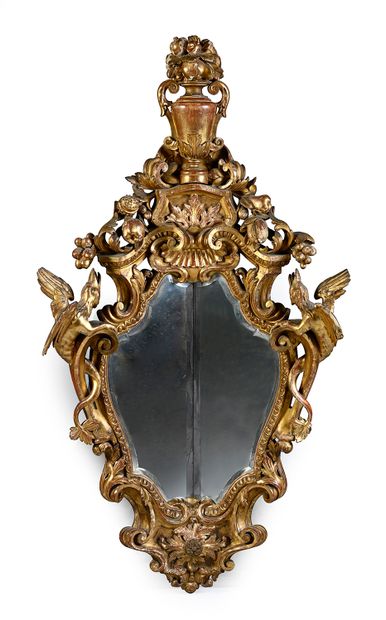 null Rare pair of gilded wood rocaille mirrors, richly carved and openwork. The frame...