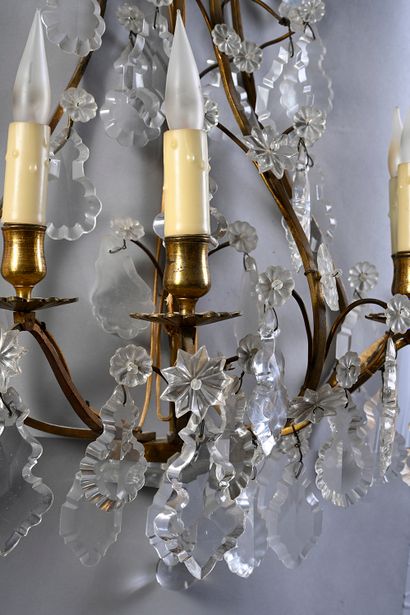 null Pair of four arms gilt bronze sconces decorated with crystal pendants.
Old work...