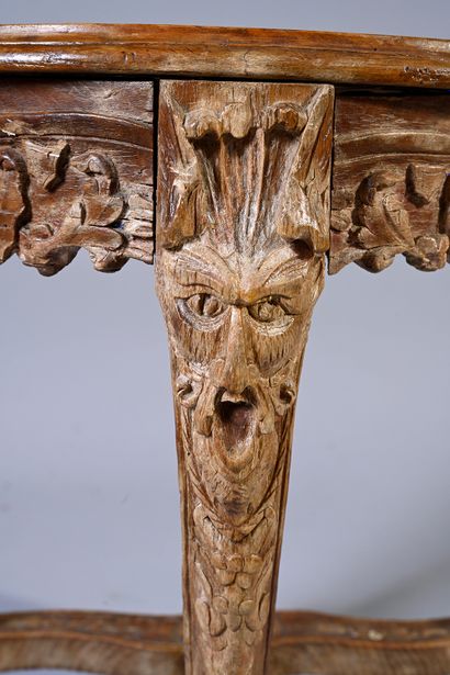 null Stool in carved natural wood with openwork decoration of foliage scrolls, cartouches,...
