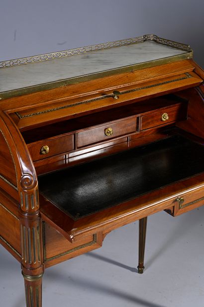 null Mahogany and carved mahogany veneer cylinder desk, white marble top, opening...