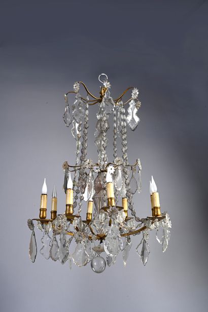 null Pair of cage chandeliers in gilt bronze and cut glass with eight arms of light...