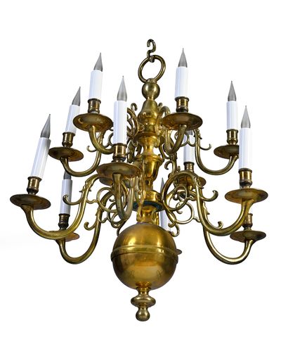 null A Dutch style ormolu chandelier with twelve lights, the baluster shaft supporting...