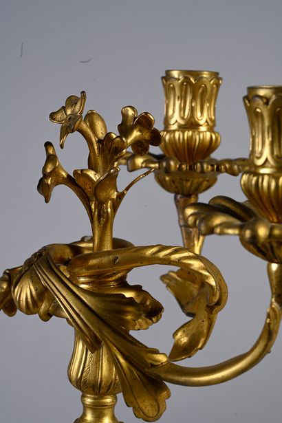 null Pair of candelabras forming torches in gilt bronze. The removable bouquet of...