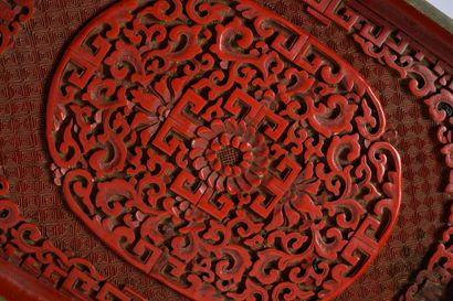 CHINE, vers 1900 Small rectangular tray in cinnabar lacquer carved with scrolls and...