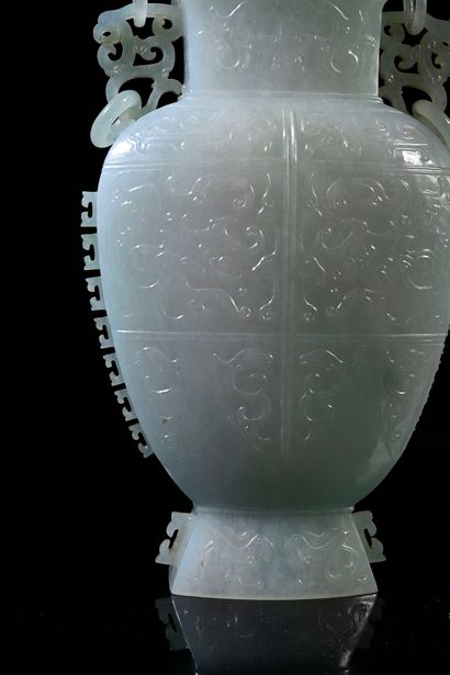 CHINE, XXe siècle Rare jadeite covered vase, the body with a delicate decoration...