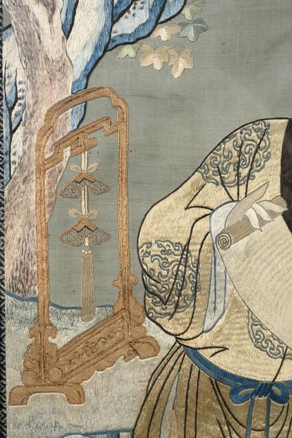 CHINE, XVIIIe siècle Set of two silk elements with polychrome embroidered characters...