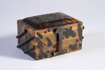 CHINE, Vers 1900 A folding box in bakelite, the lid decorated with a chased metal...