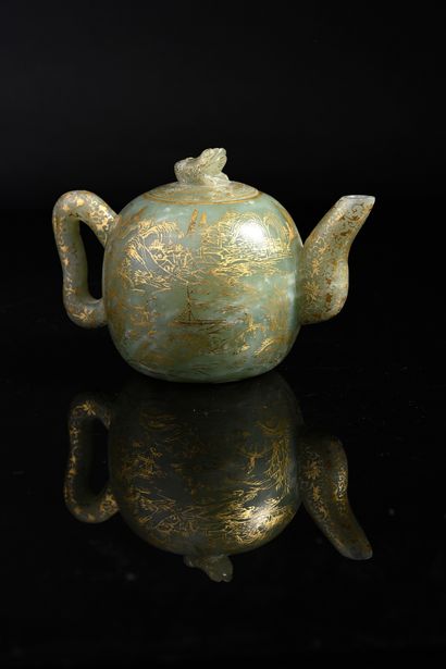 CHINE, vers 1900 Elegant celadon jade teapot with carved and gold painted decoration...