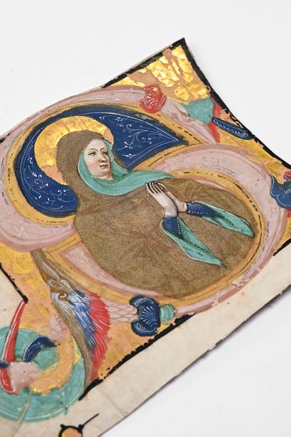 null Illumination on vellum, polychrome and gilded, initial S with a holy woman with...