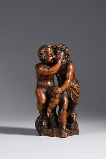 null L'Enfant Jésus embrassant le petit saint Jean-Baptiste en buis sculpté en ronde-bosse....
