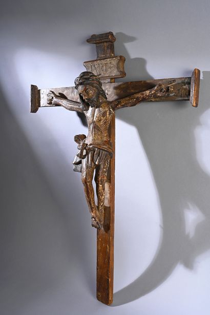 null Crucifix with Christ in carved and polychromed wood. Head girded with a braided...