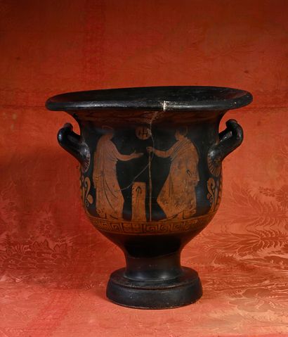 null Bell-shaped krater with red figures decorated on one side with a scene representing...