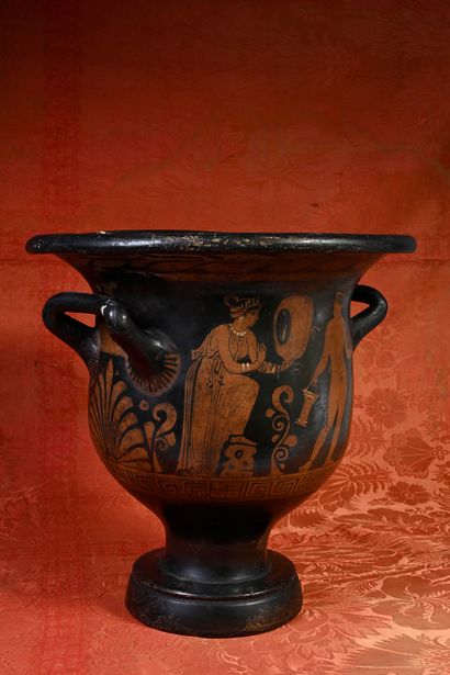 null Bell-shaped krater with red figures decorated on one side with a scene representing...