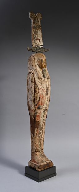 null Large statuette representing Ptah-Sokar-Osiris mummiform, standing on a parallelepiped...