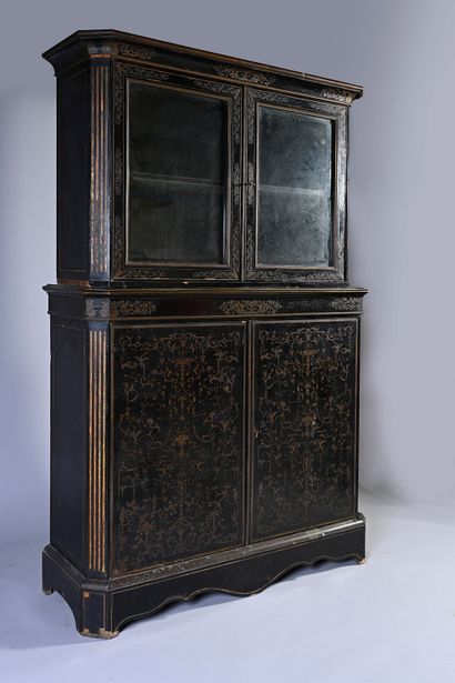 null Piece of furniture two bodies in veneer of ebony and blackened wood with decoration...