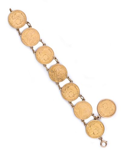 null Bracelet en or 18k 750e, constitué de sept pièces de 20 francs or plus une huitième...