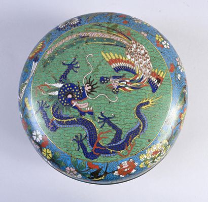 null Covered box in cloisonné enamels of circular form decorated with dragon and...