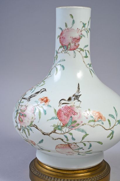 null Porcelain vase of the pink family, mark with six characters Qianlong in iron...