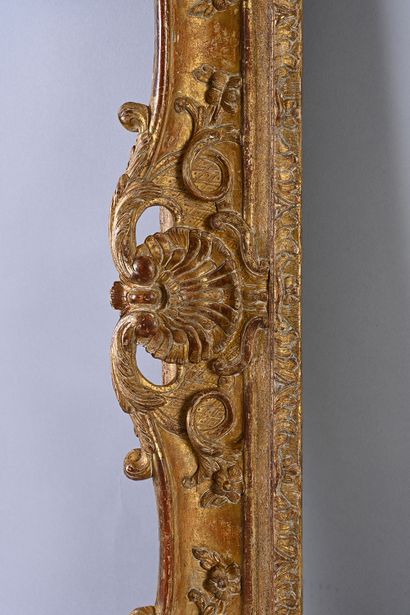 null Very beautiful giltwood frame, carved and openworked with shells, foliage, flowers...