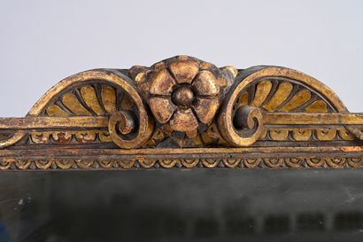 null Framed in the Sansovino style in carved, blackened and gilded resinous wood...