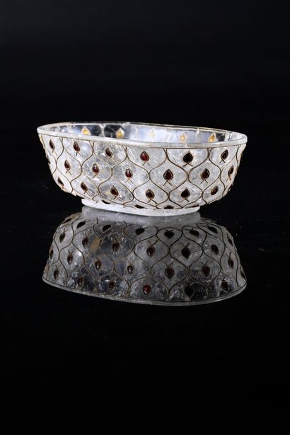 null Rock crystal cup, resting on a small heel decorated with buds inlaid with small...